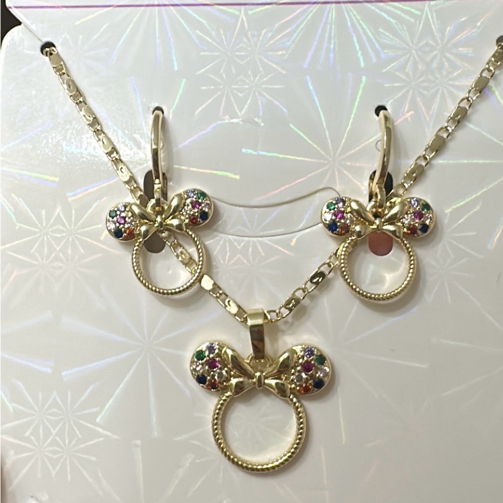 Gold Circular Earrings with Playful Design